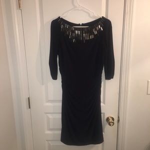 Beautiful beaded three quarter length sleeve dress
